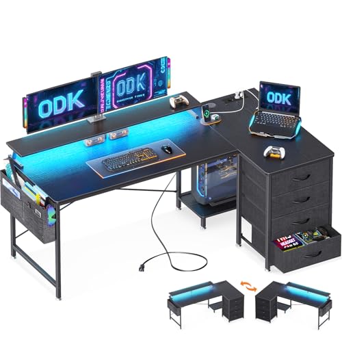 ODK Eckschreibtisch mit 4 Stoff Schubladen, Reversible Schreibtisch L Form mit 2 Steckdosen und 2 USB Ladeanschluss, Gaming Tisch L Form mit LED&Monitorständer für Home Office (Schwarz, 160x80x85.9cm)