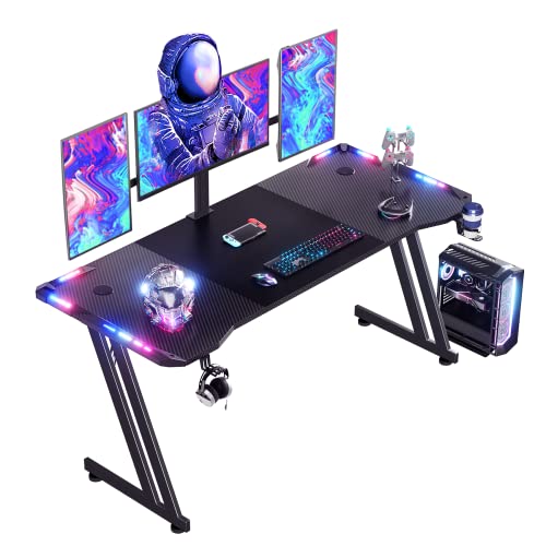 HLONONE 160 x 60cm Gaming Schreibtisch mit LED, PC Tisch Gaming mit Kohlefaseroberfläche, Stabiler Computertisch für Gaming und Home Office mit Kopfhörerhaken und Getränkehalter, Schwarz